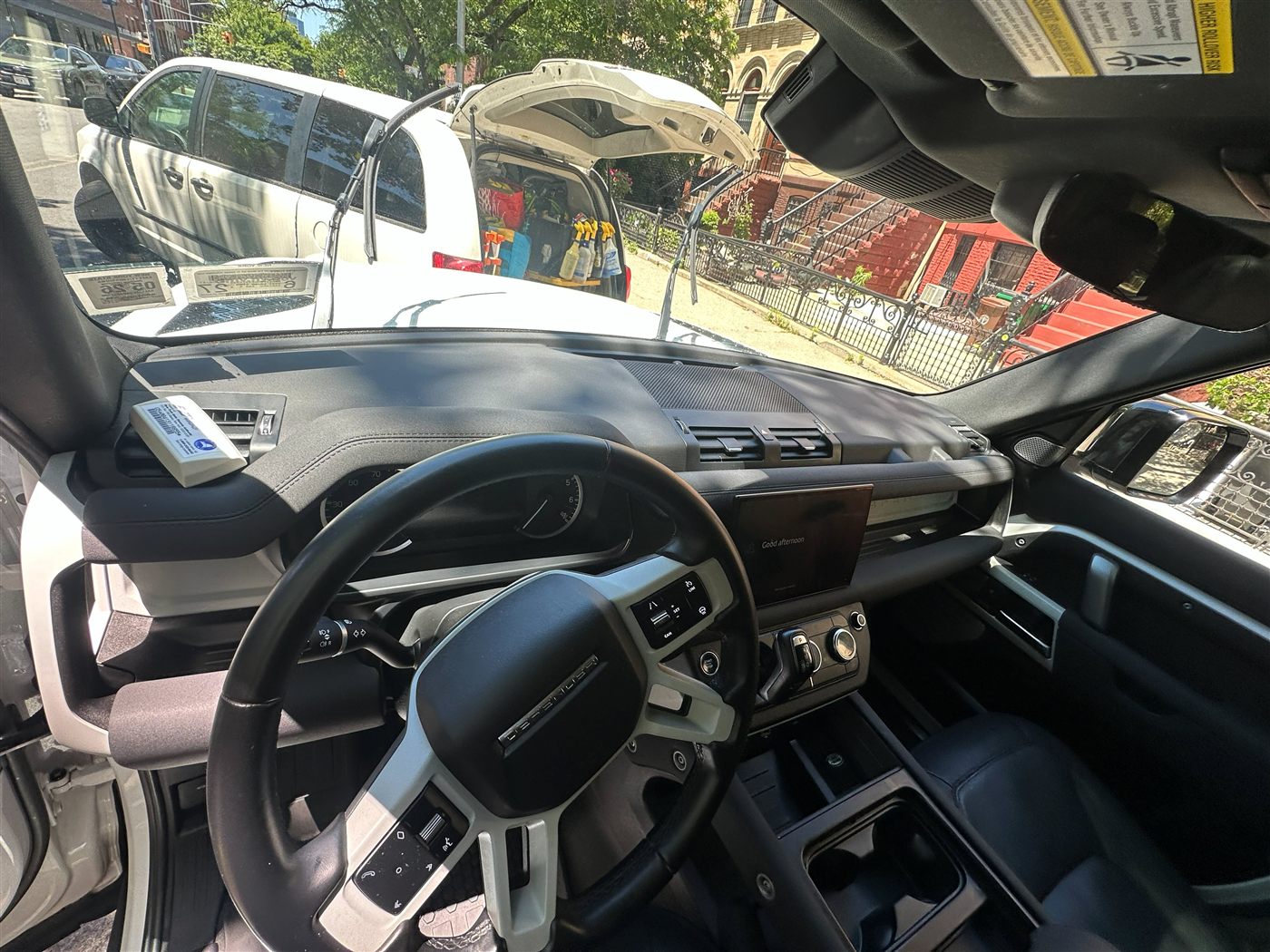 Land Rover Defender interior after deep clean — spotless dash and console