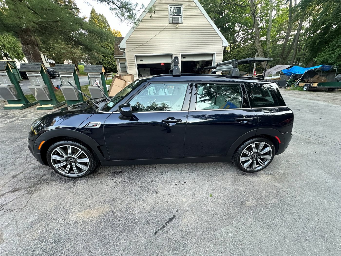 Mini Cooper Clubman side after exterior detail — deep gloss on dark blue paint