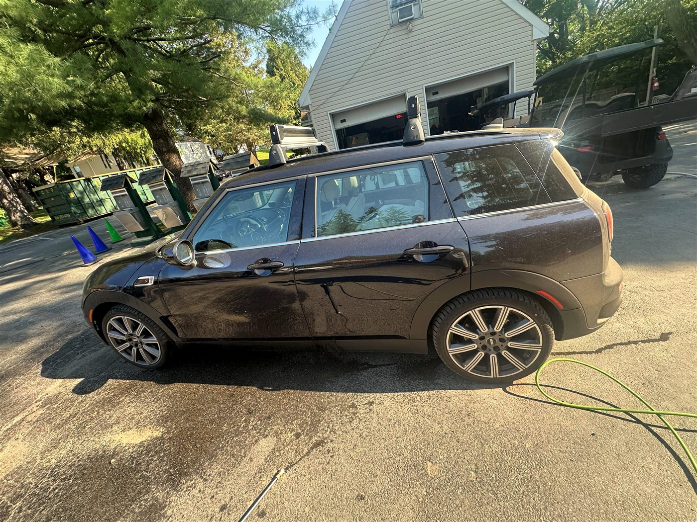 Mini Cooper Clubman side before exterior detail — road dust on lower doors and wheels