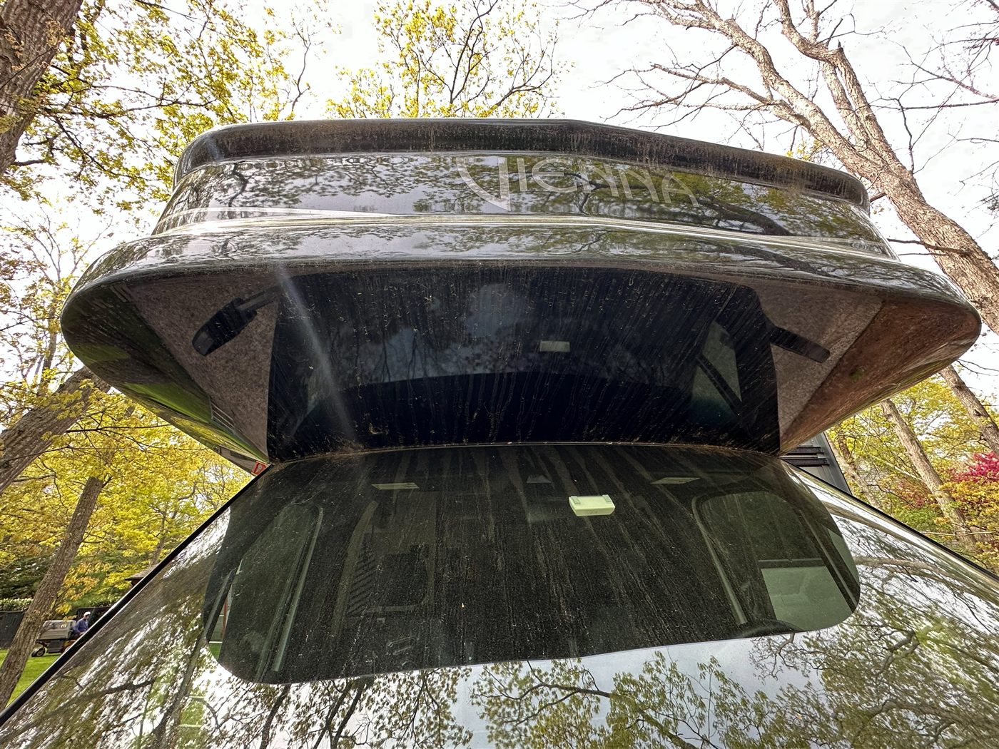 Renegade Vienna RV front before exterior detail — mud streaks on black front cap