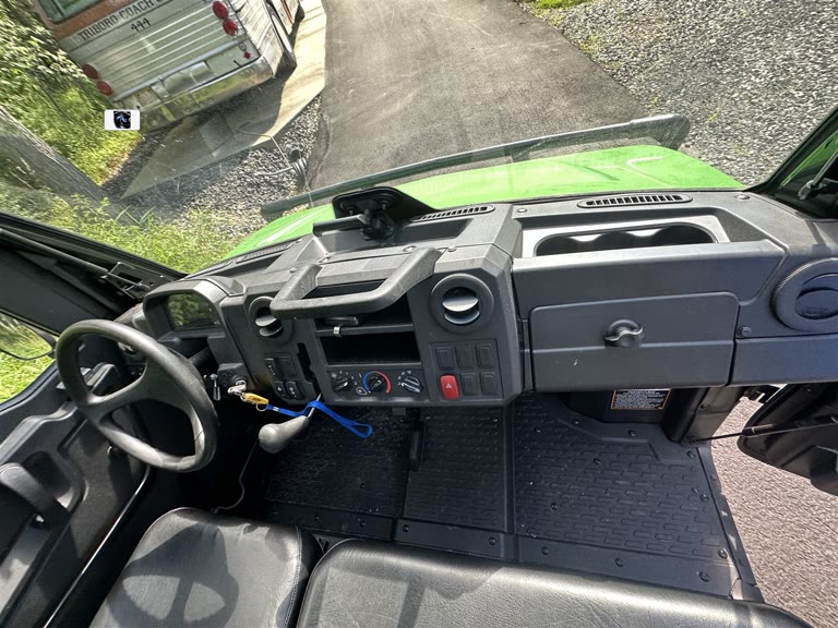 John Deere Gator interior before mobile detailing
