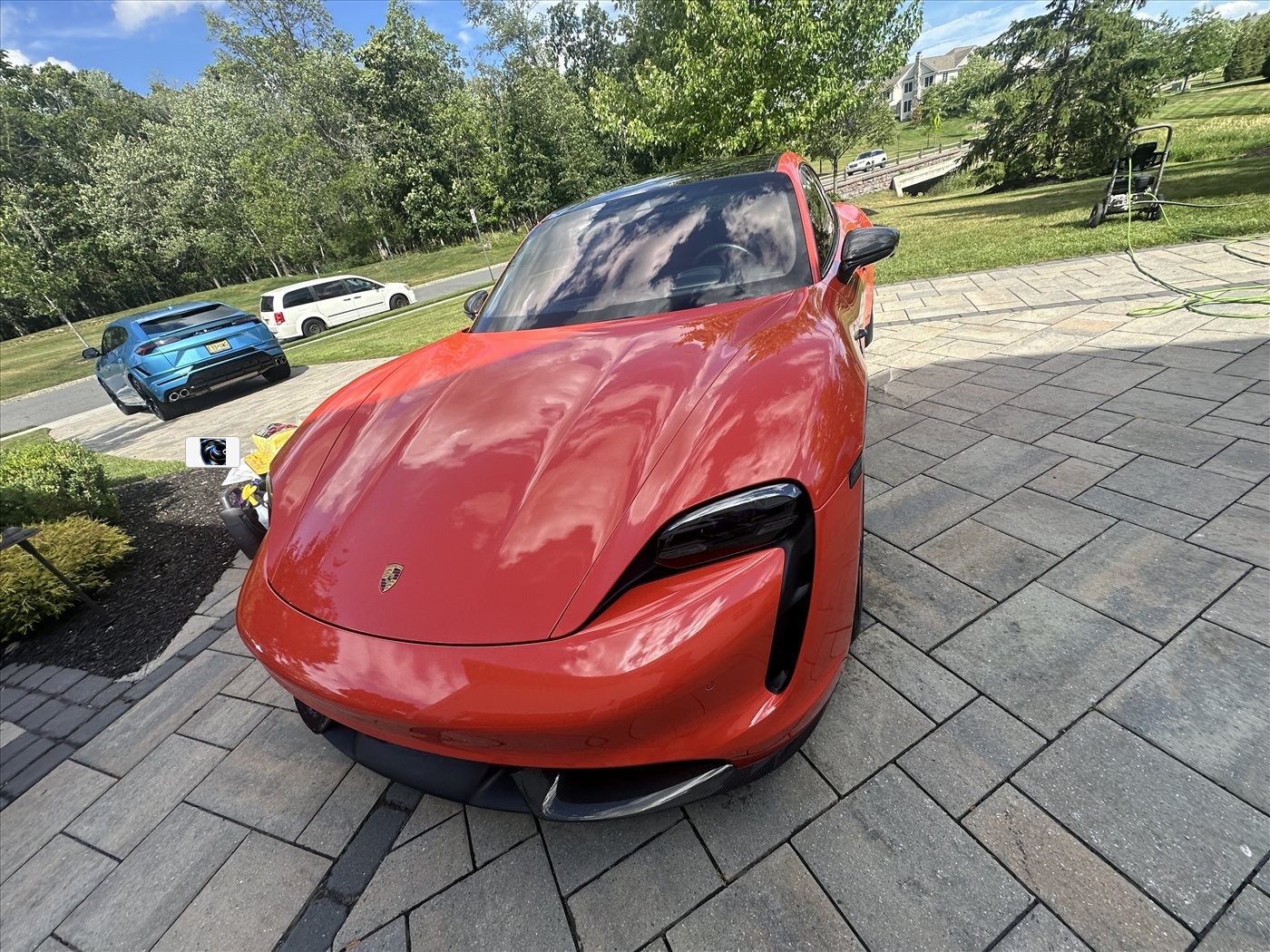 Porsche after exterior detail — mirror-gloss paint and dressed trim